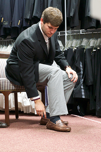 Student trying on suit in Dress Your Best Closet